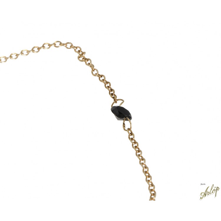 Pulsera en oro rojo de 18 Kts. Con 1 brillante negro perforado.