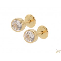Topos redondos en oro amarillo de 18 Kts con 1 circón en bisel.