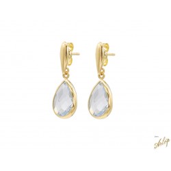 Aretes en oro amarillo de 18 Kts. Lágrima en oro sobre topacio azul, también en lágrima engastado en bisel.